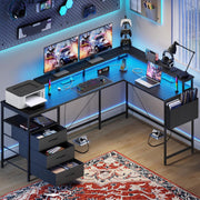 View 3 Drawers L Shaped Desk 63 Inch, 2 Power Strips (6 AC) and LED, Large Gaming Desk & 2 Monitor Stands, L Shape Computer Desk, Stable and Sturdy Home Office Desk, Fabric Drawers, Black image 2